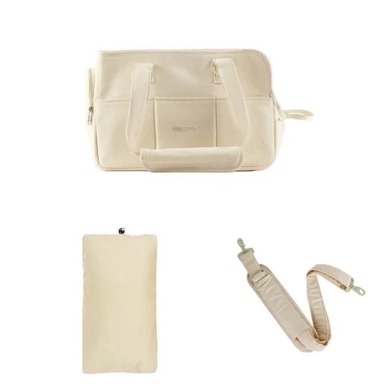 Small dog carrier bag in beige with shoulder strap and mat, for Cavoodles
