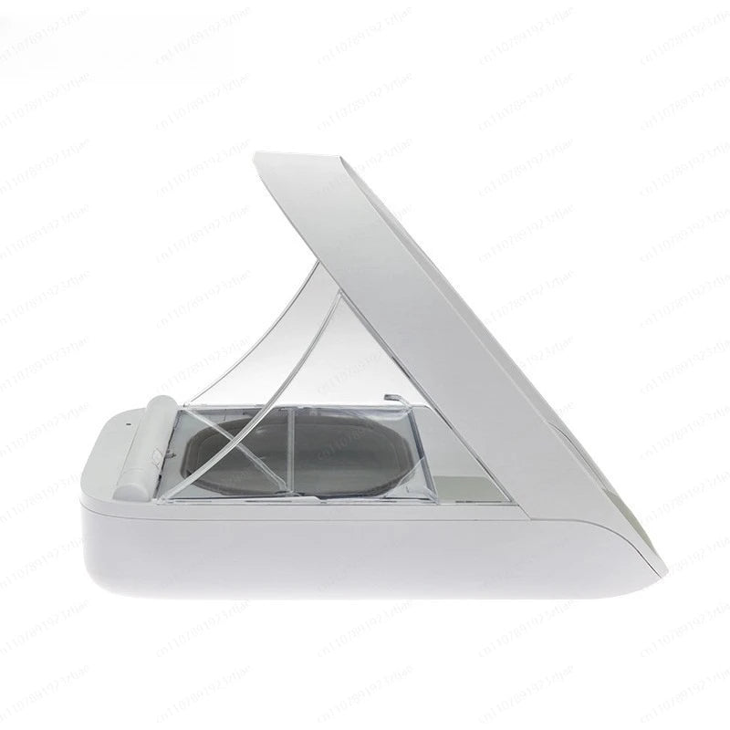Automatic pet feeder with raised access cover