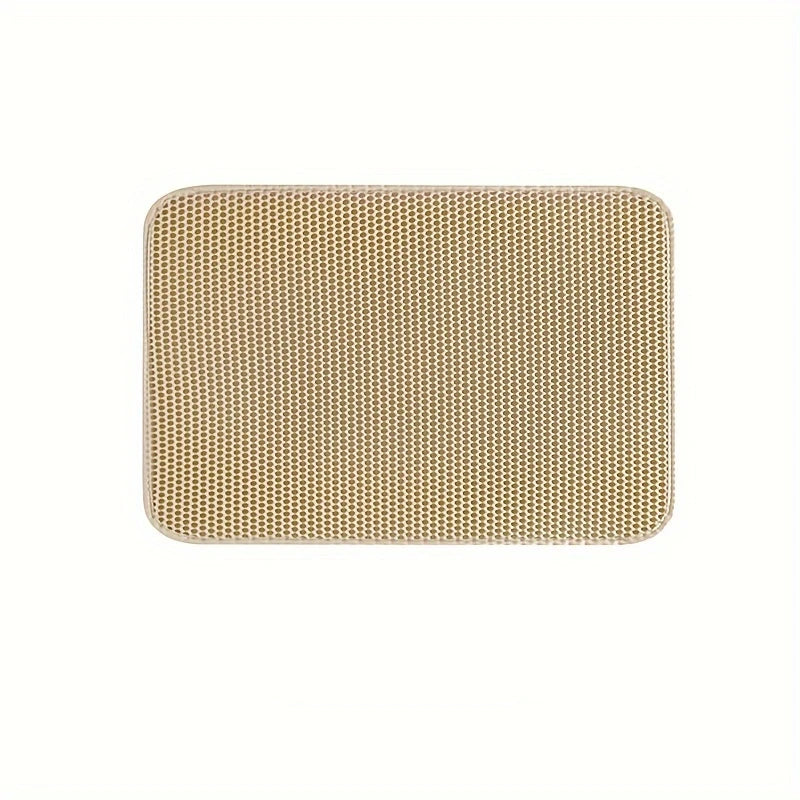 Beige rectangular pet mat with perforated non-slip surface and rounded corners