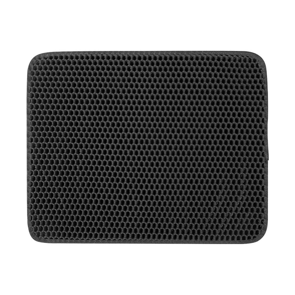 Black rectangular pet mat with perforated non-slip surface and rounded corners