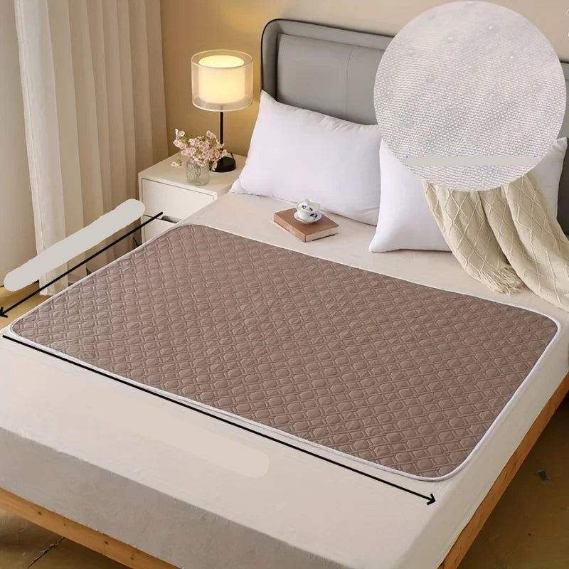 Brown quilted dog bed mat with a padded diamond-pattern surface displayed on a bedroom bed