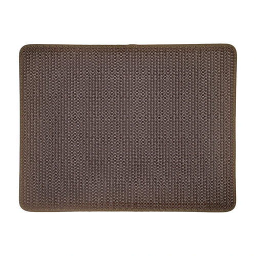 Brown rectangular pet mat with textured honeycomb surface and rounded corners