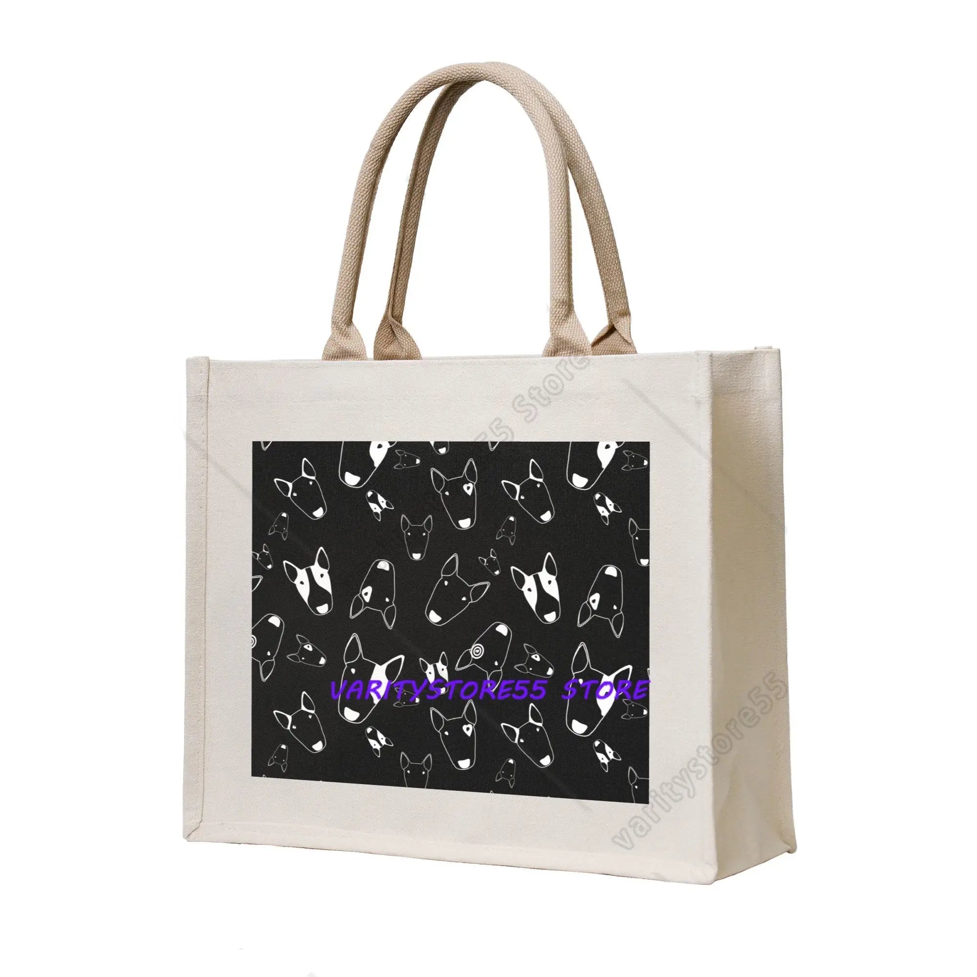 Cream canvas tote bag featuring a black panel with repeating Bull Terrier face illustrations