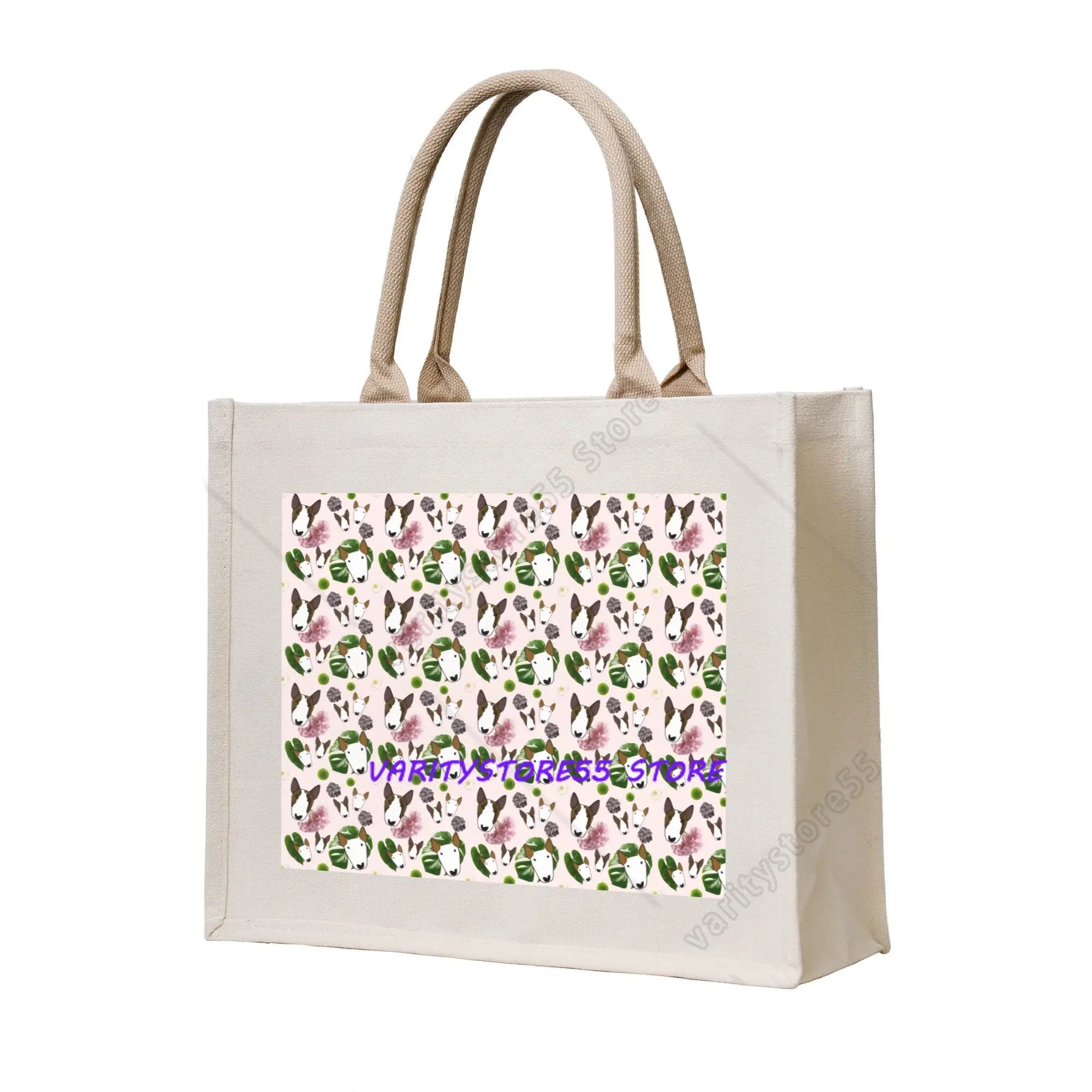 Cream canvas tote bag featuring a repeating Bull Terrier pattern with pink flowers and green leaves