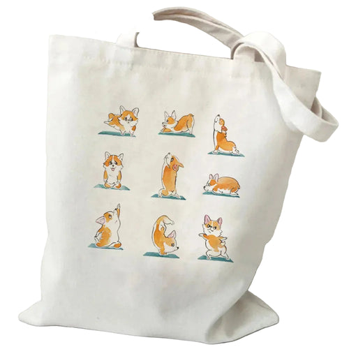 Cream canvas tote bag with illustrated Corgis in different yoga poses and long shoulder straps