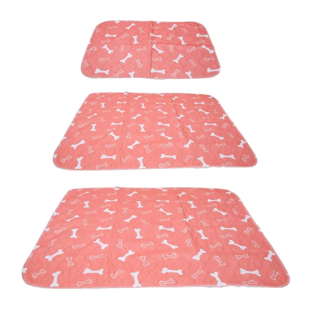 Coral quilted dog bed mat with white bone pattern shown in three different sizes