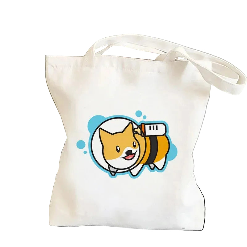 Cream canvas tote bag featuring a cute cartoon Corgi dressed as a bee with yellow and black stripes