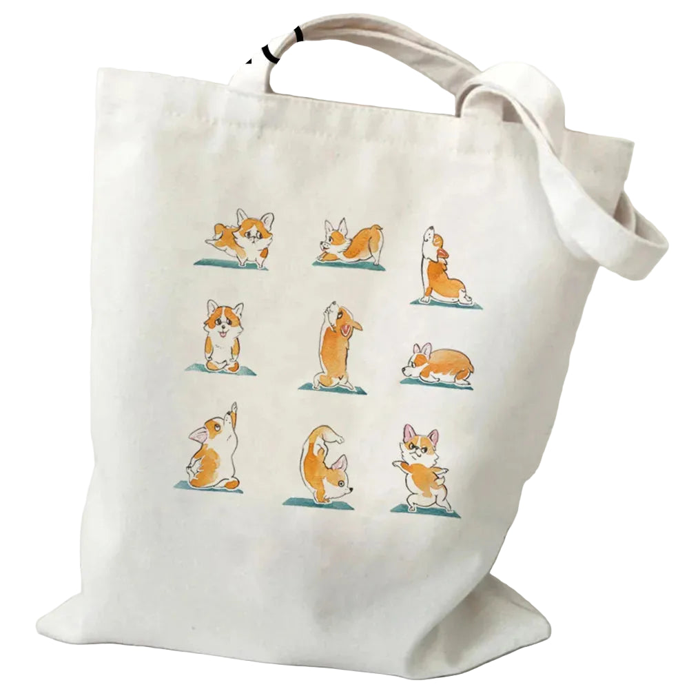 Cream canvas tote bag featuring multiple illustrated Corgis in different yoga poses