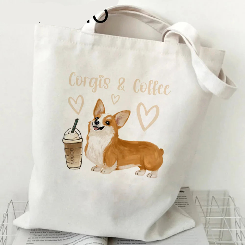 Cream canvas tote bag featuring a Corgi, iced coffee and heart illustrations with the words Corgis & Coffee