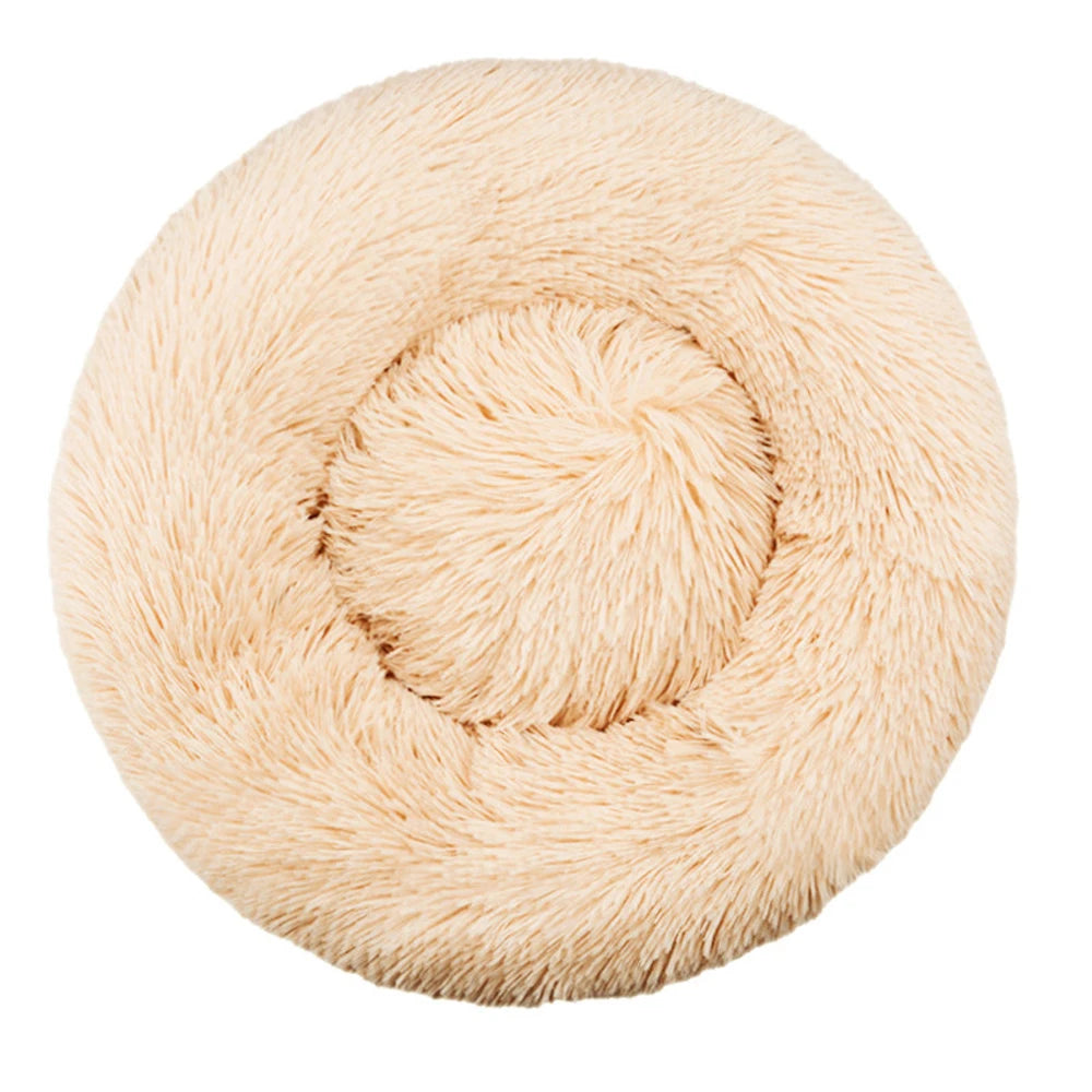 Cream round plush donut pet bed with soft faux fur and raised cushioned sides for cats and small dogs