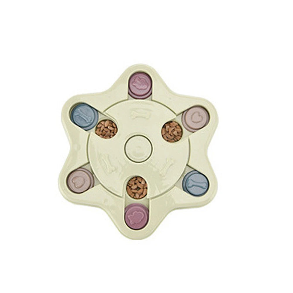 Cream star-shaped interactive dog puzzle feeder with sliding treat compartments filled with dry dog food