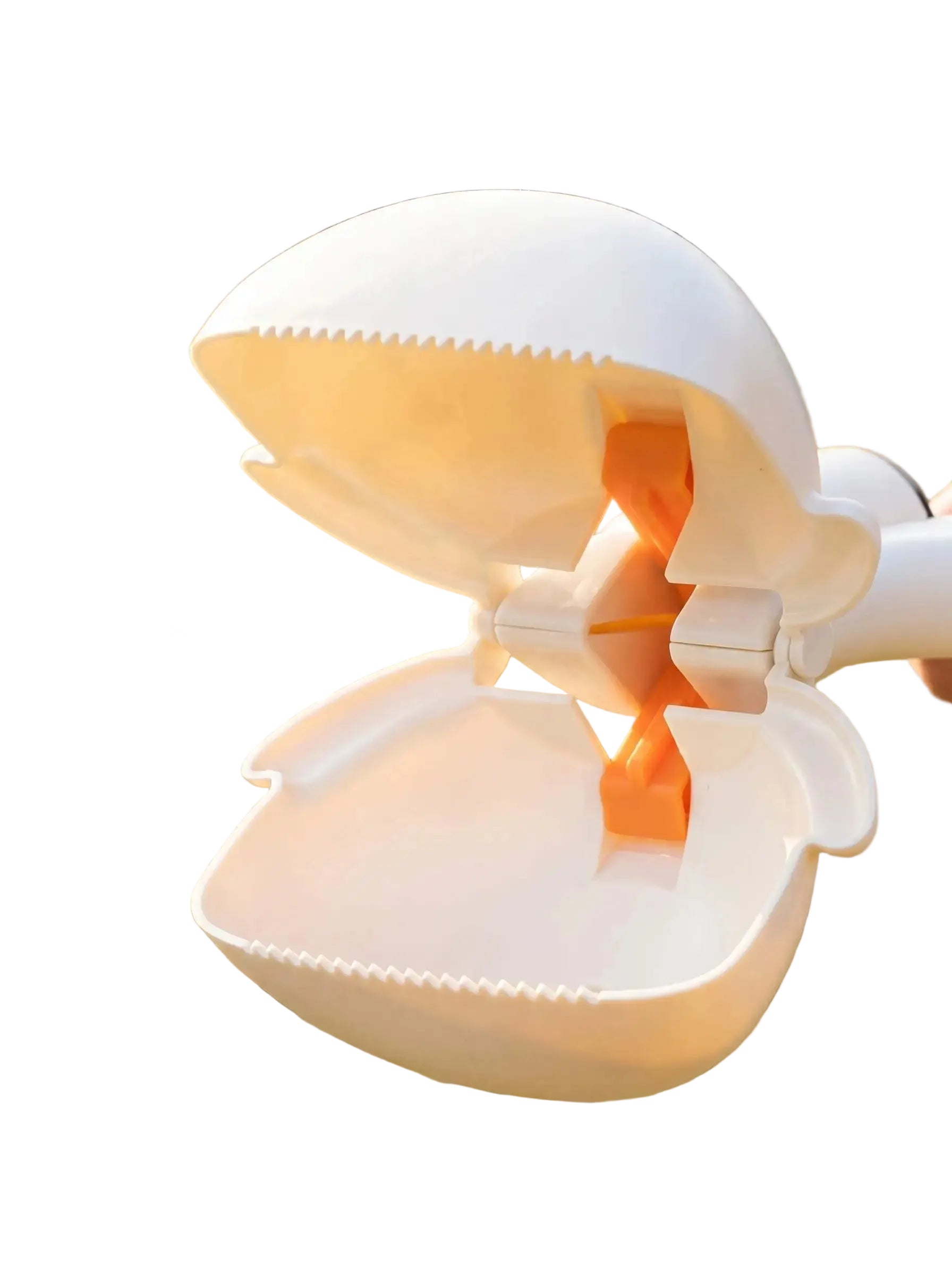 Close-up of dog poop scooper claw with serrated edges for easy waste pickup