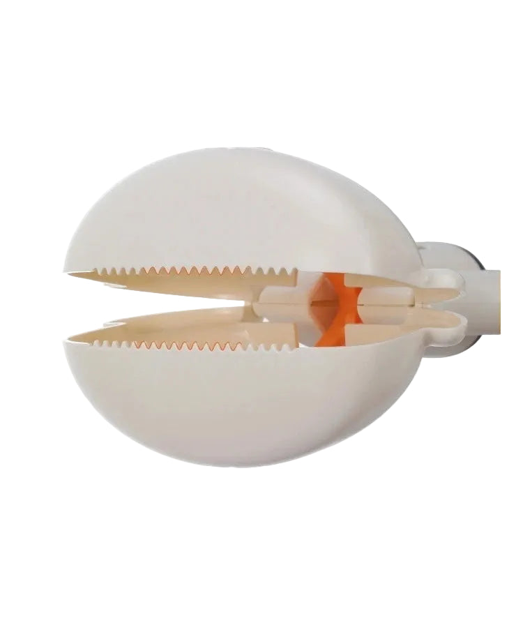 Dog poop scooper claw with serrated jaws for picking up pet waste