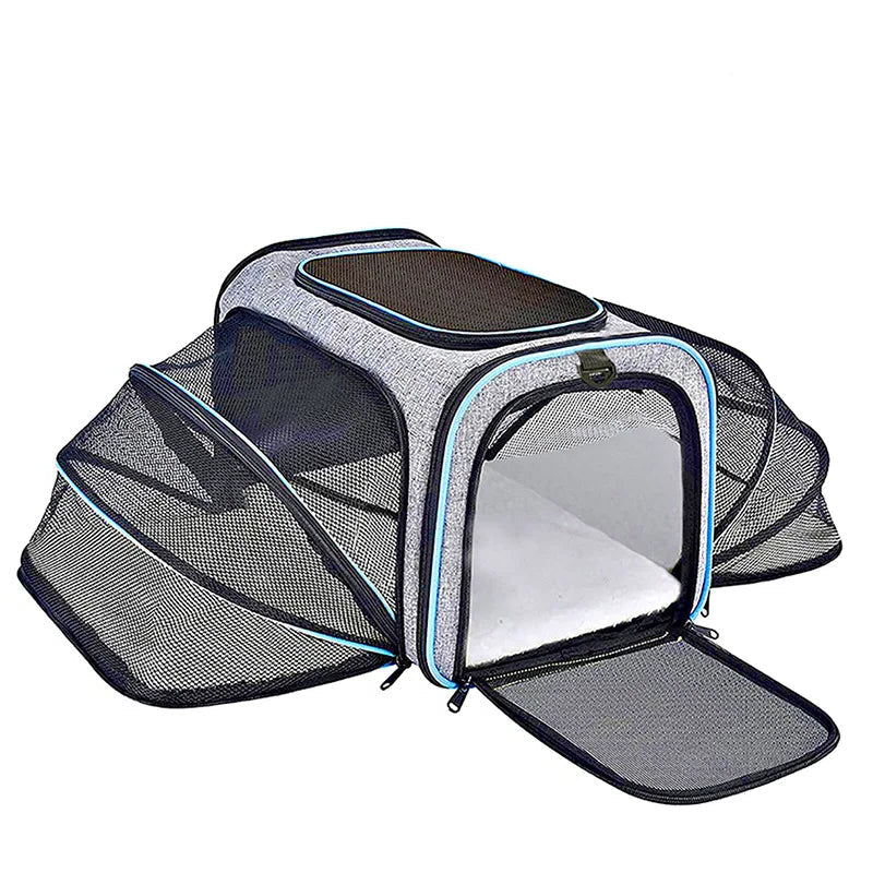 Grey expandable pet carrier bag with breathable mesh sides, zippered front opening and padded interior