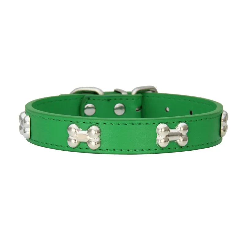 Colourful dog collars in pink, yellow, blue, black, orange, green, red and other colours with silver bone-shaped studs