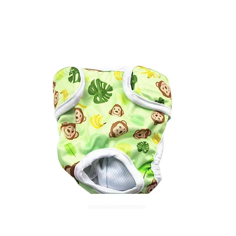 Green reusable female dog diaper with monkey, banana and tropical leaf print, tail hole and adjustable fastening
