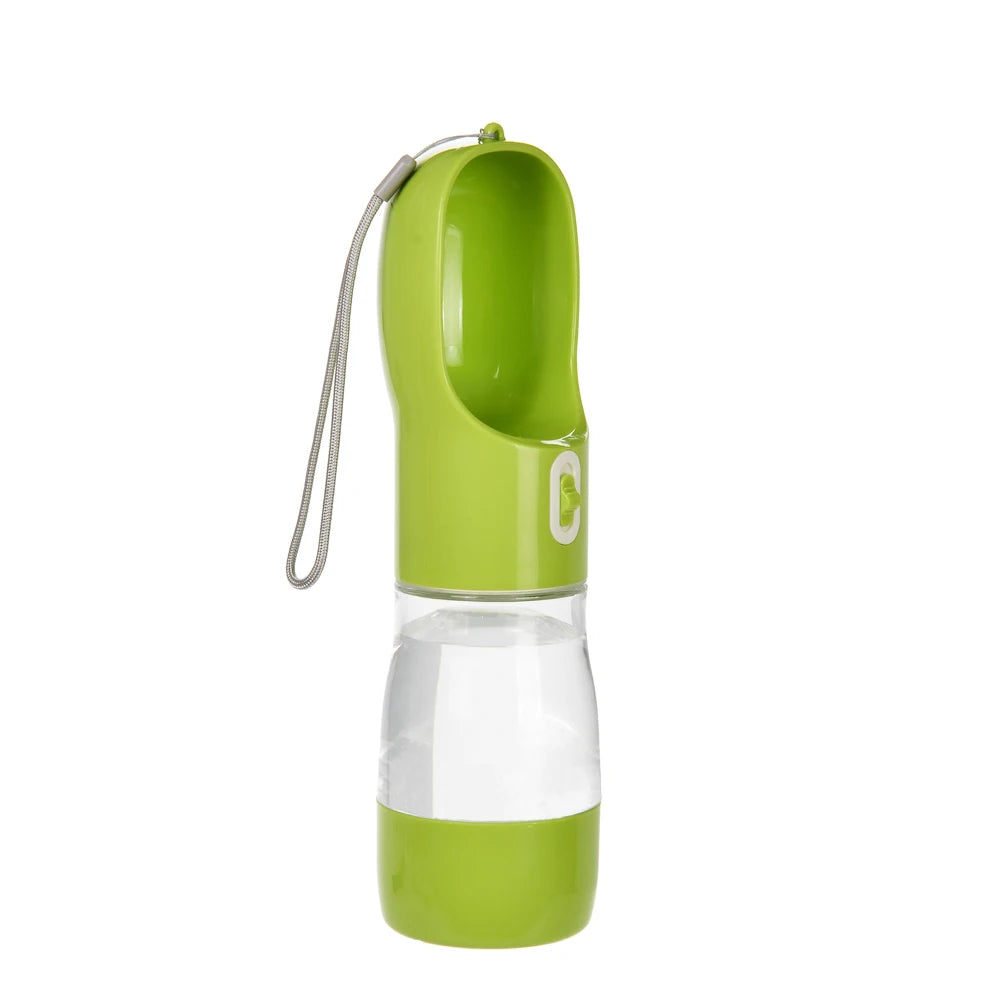 Green portable dog water bottle with built-in drinking bowl, clear water reservoir and wrist strap