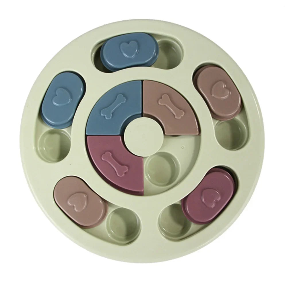 Green round interactive dog puzzle feeder with sliding treat compartments and rotating centre pieces