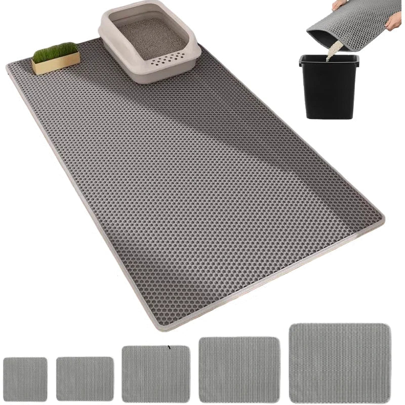 Grey cat litter trapping mat with honeycomb surface, shown under a litter tray for catching loose cat litter