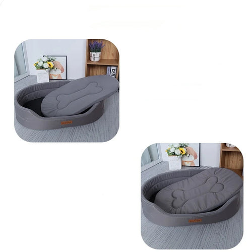 Navy blue oval dog bed with raised sides and a padded bone-shaped design in the centre
