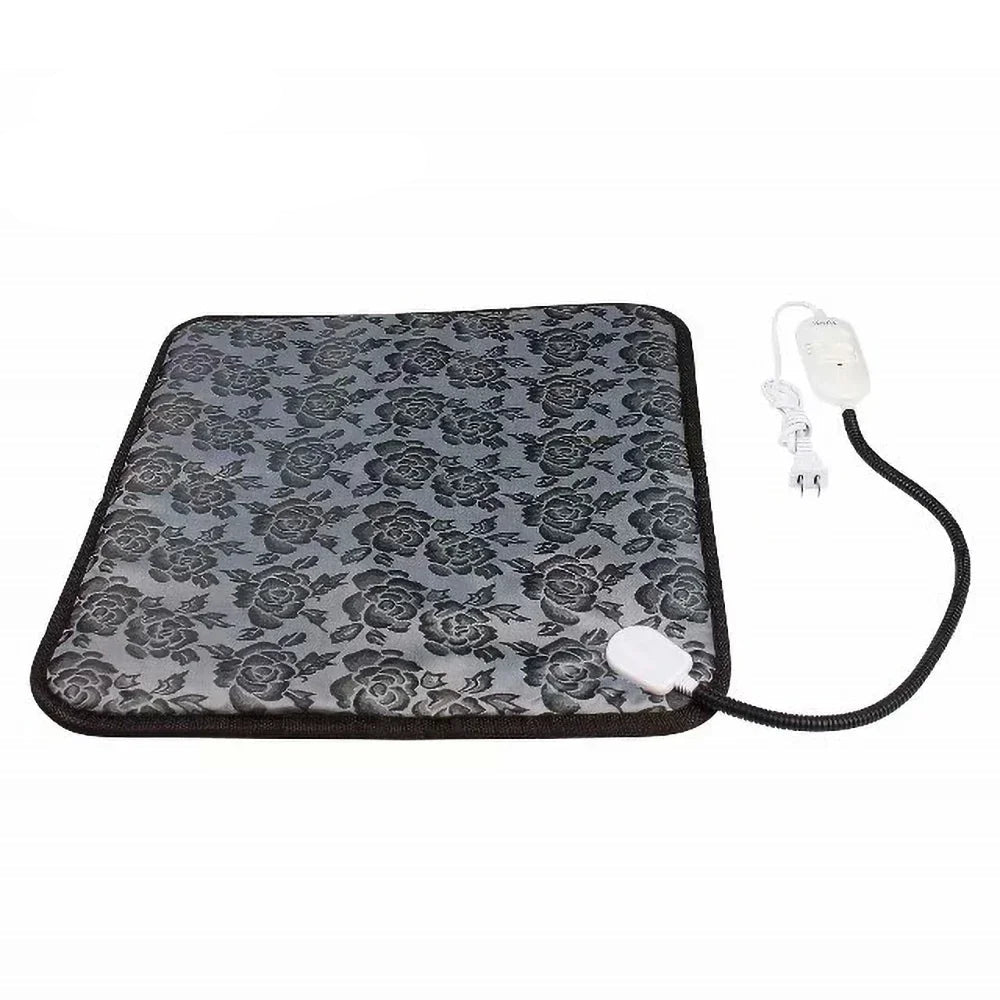 Grey electric heated pet mat with black floral pattern, power cord and temperature controller