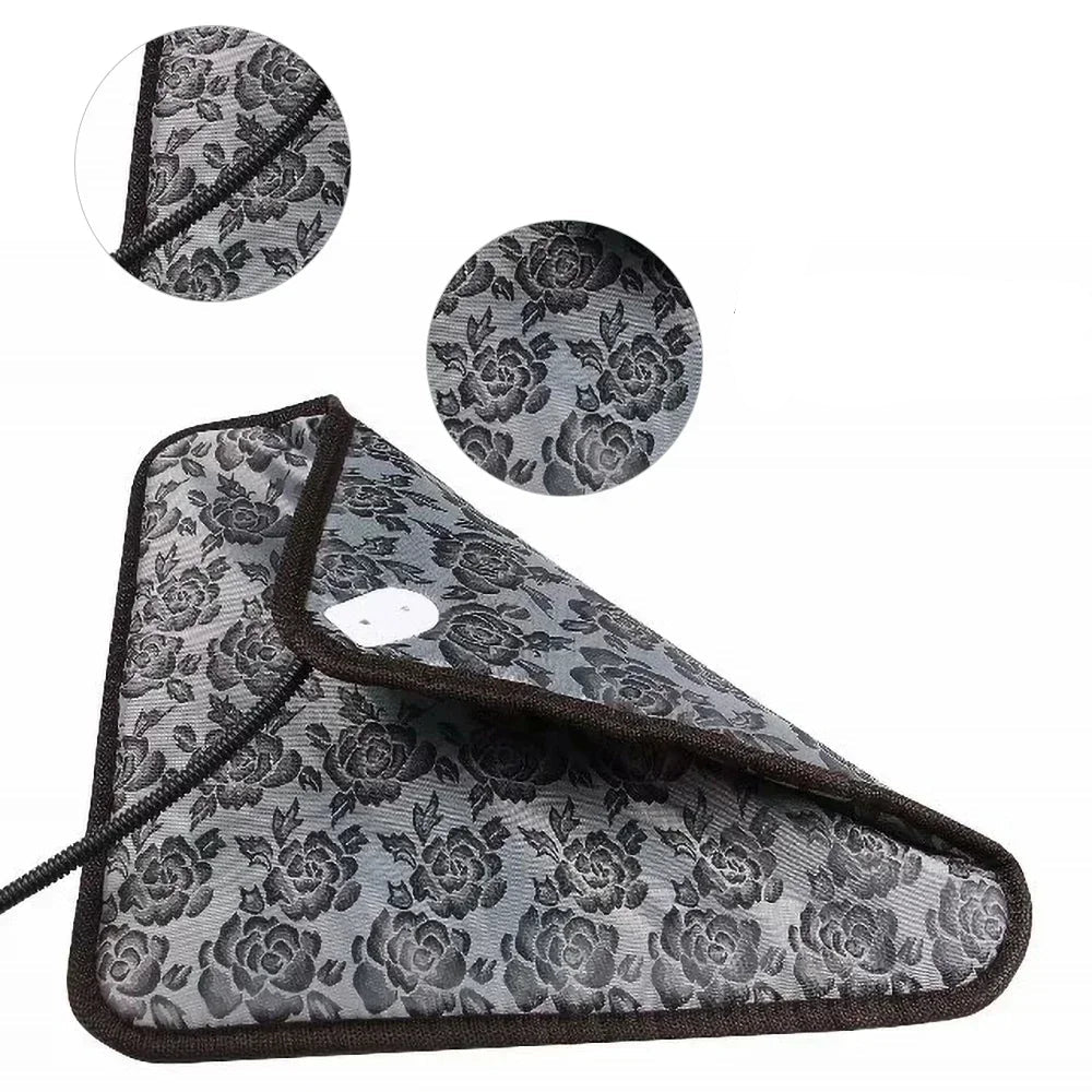 Grey electric heated pet mat with black paw print pattern, power cord and temperature controller