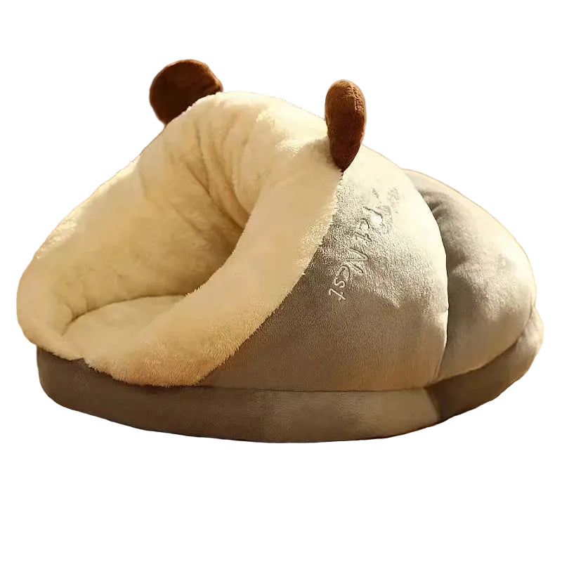 Grey plush covered pet bed with soft cream lining and playful antennae design for cats and small dogs