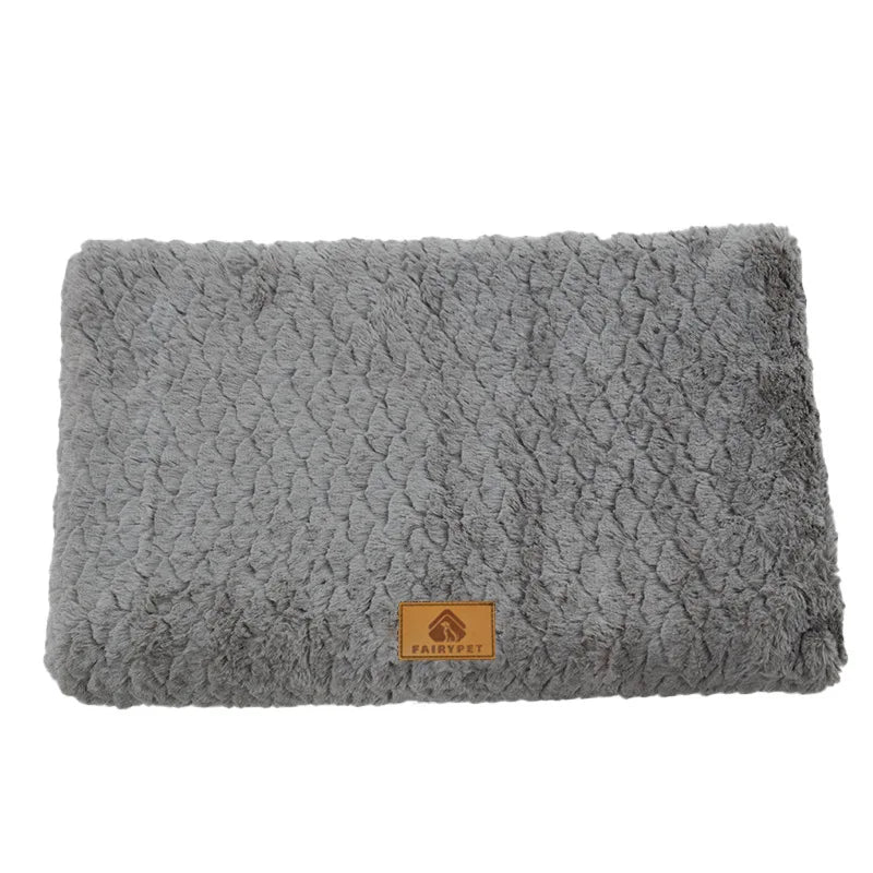 Grey plush dog bed mat with a soft textured cushioned surface
