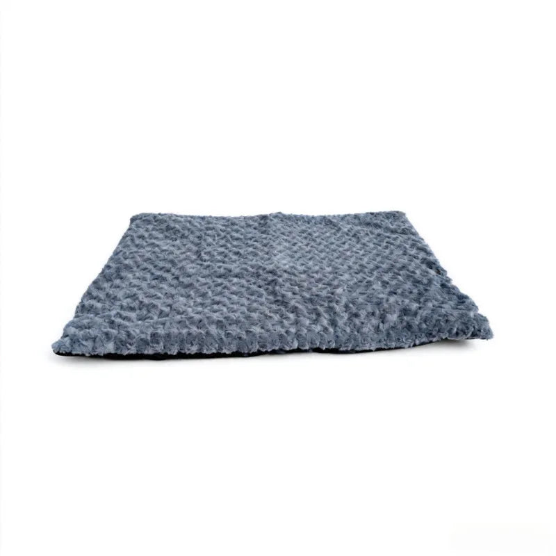 Grey plush self-warming pet mat with soft textured surface and cushioned design