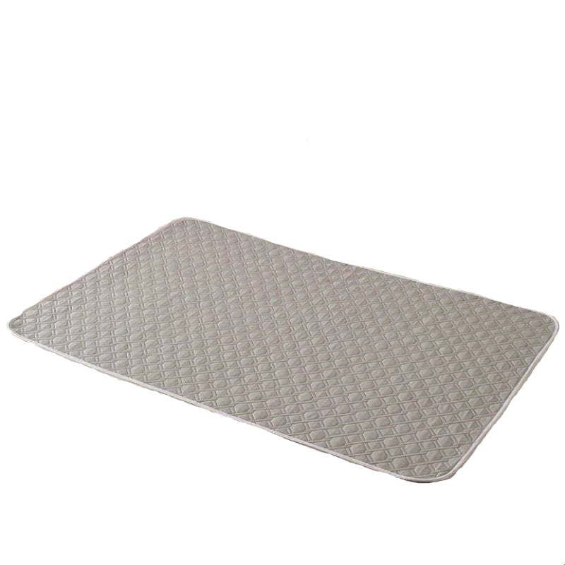 Grey quilted dog bed mat with a padded rectangular design and diamond-patterned surface