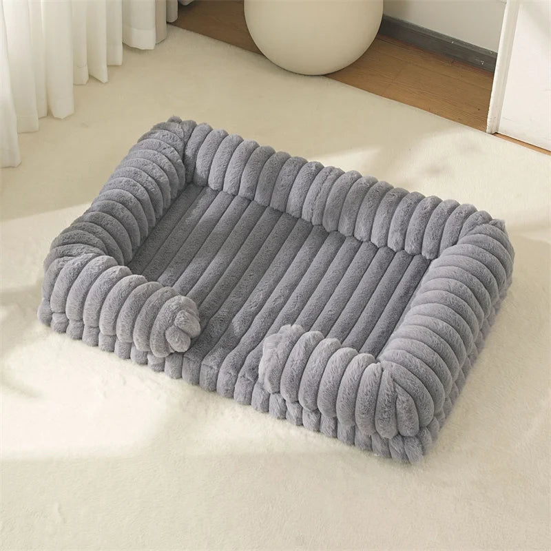 Grey ribbed dog bed mat with soft padded base and raised bolster sides for extra comfort