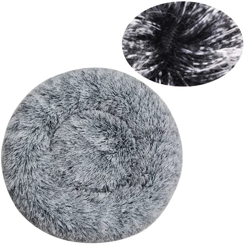 Grey round plush donut pet bed with soft faux fur and raised cushioned sides for cats and small dogs