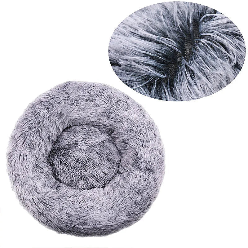 Grey round plush donut pet bed with soft faux fur and raised cushioned sides for cats and small dogs