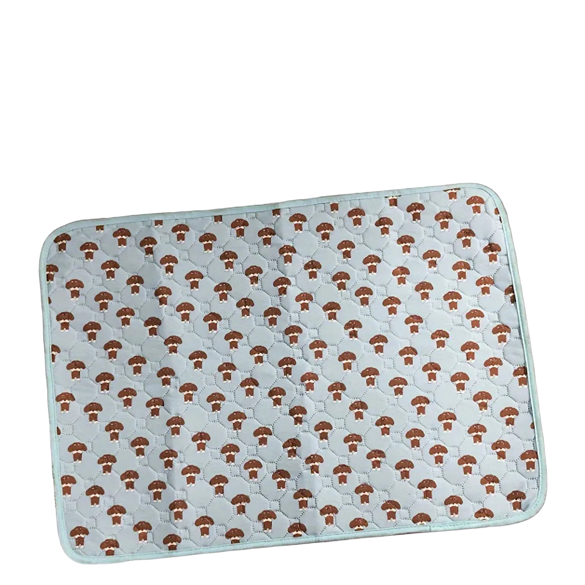 Light blue quilted dog bed mat with brown mushroom pattern, padded surface and rounded corners