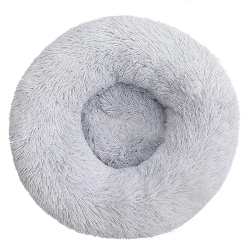 Light grey round plush donut pet bed with soft faux fur and raised cushioned sides for cats and small dogs
