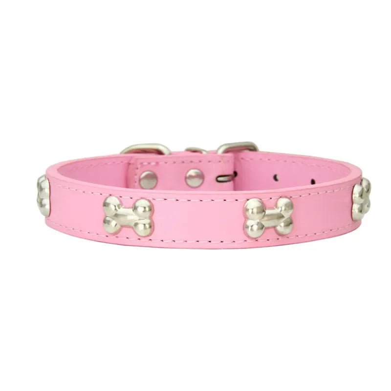 Light pink dog collar with silver bone-shaped studs and adjustable buckle fastening