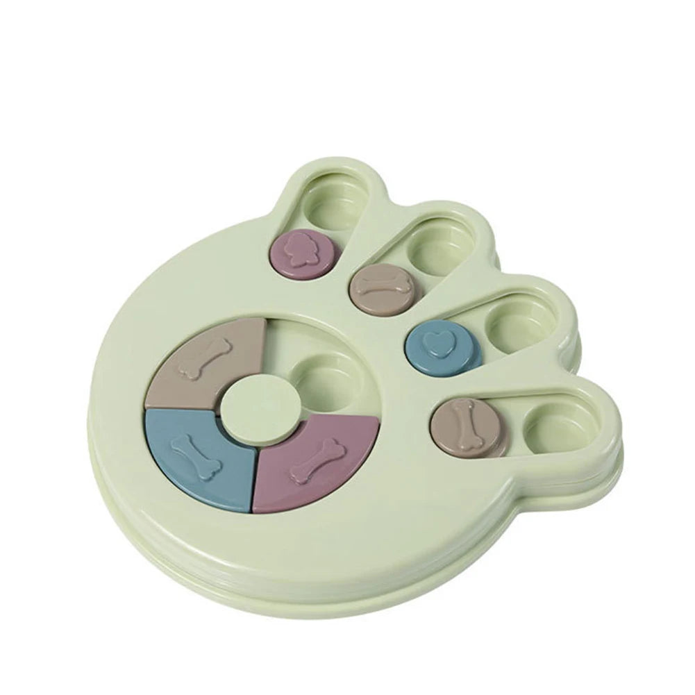 Mint paw-shaped interactive dog puzzle feeder with sliding treat compartments and bone-shaped covers