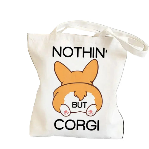 Cream canvas tote bag featuring a cartoon Corgi rear with the phrase Nothin' But Corgi