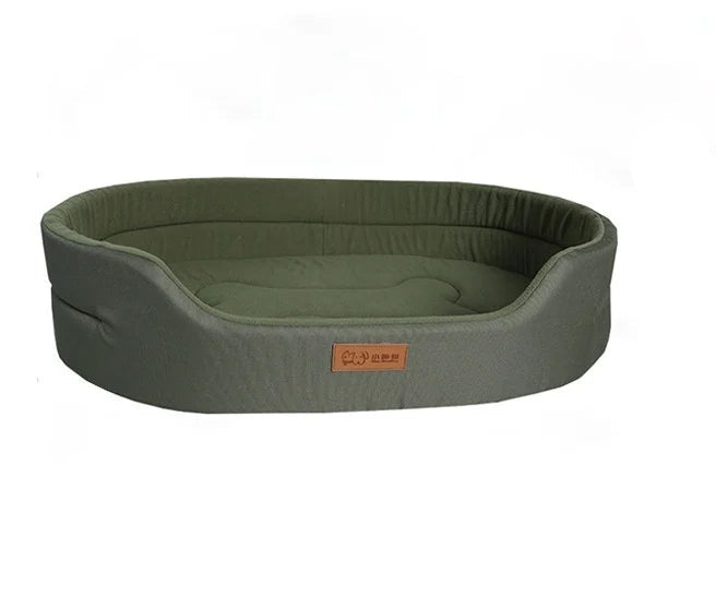 Olive green oval dog bed with raised padded sides, low front entry and a bone-shaped cushion design