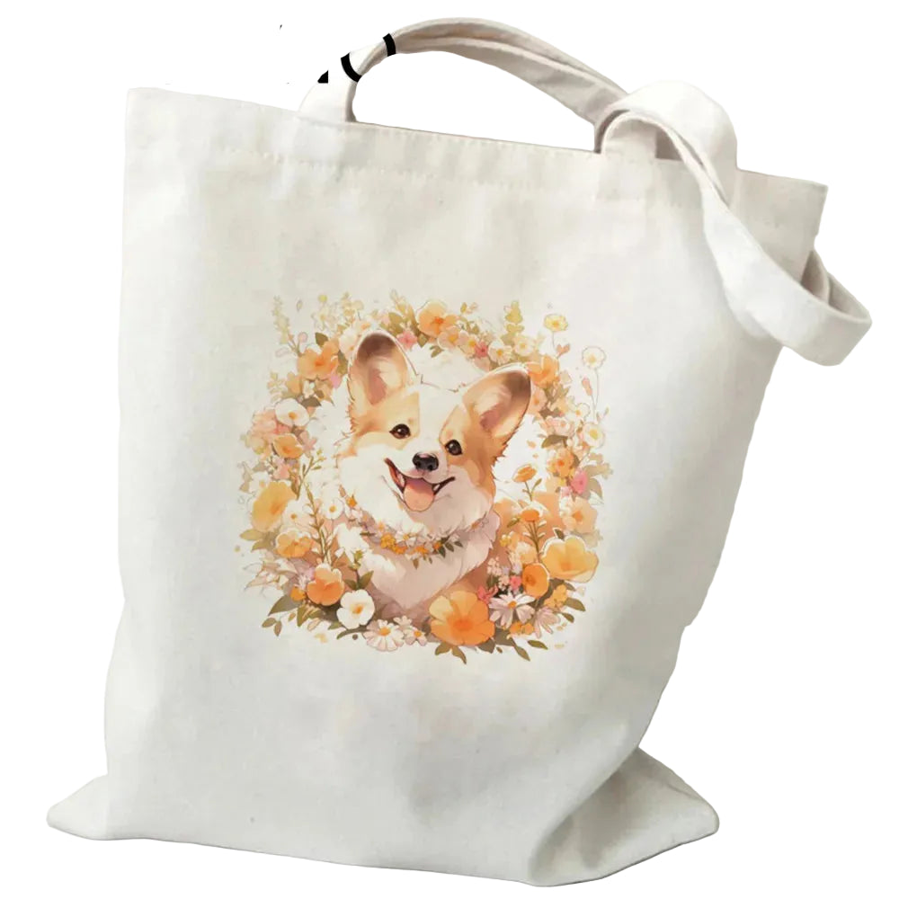 Cream canvas tote bag featuring a smiling Corgi surrounded by orange and white flowers