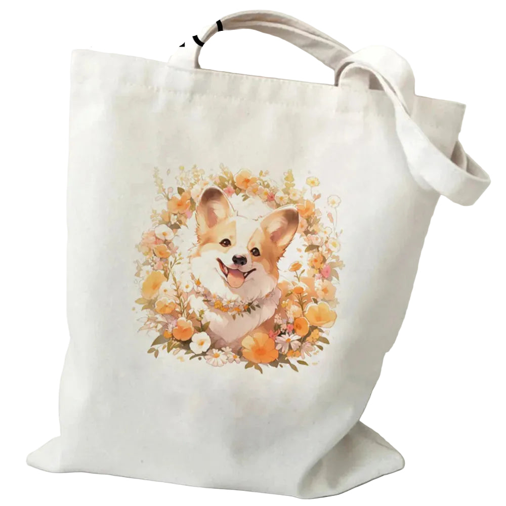 Cream canvas tote bag featuring a smiling Corgi framed by orange and white flowers