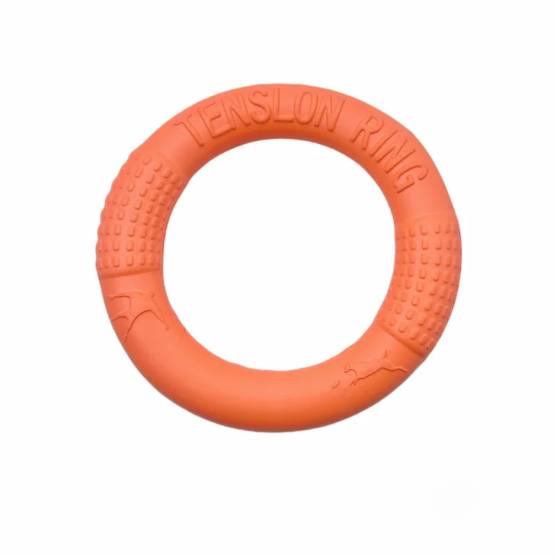 Orange ring-shaped dog chew toy with textured grip sections for chewing and interactive play
