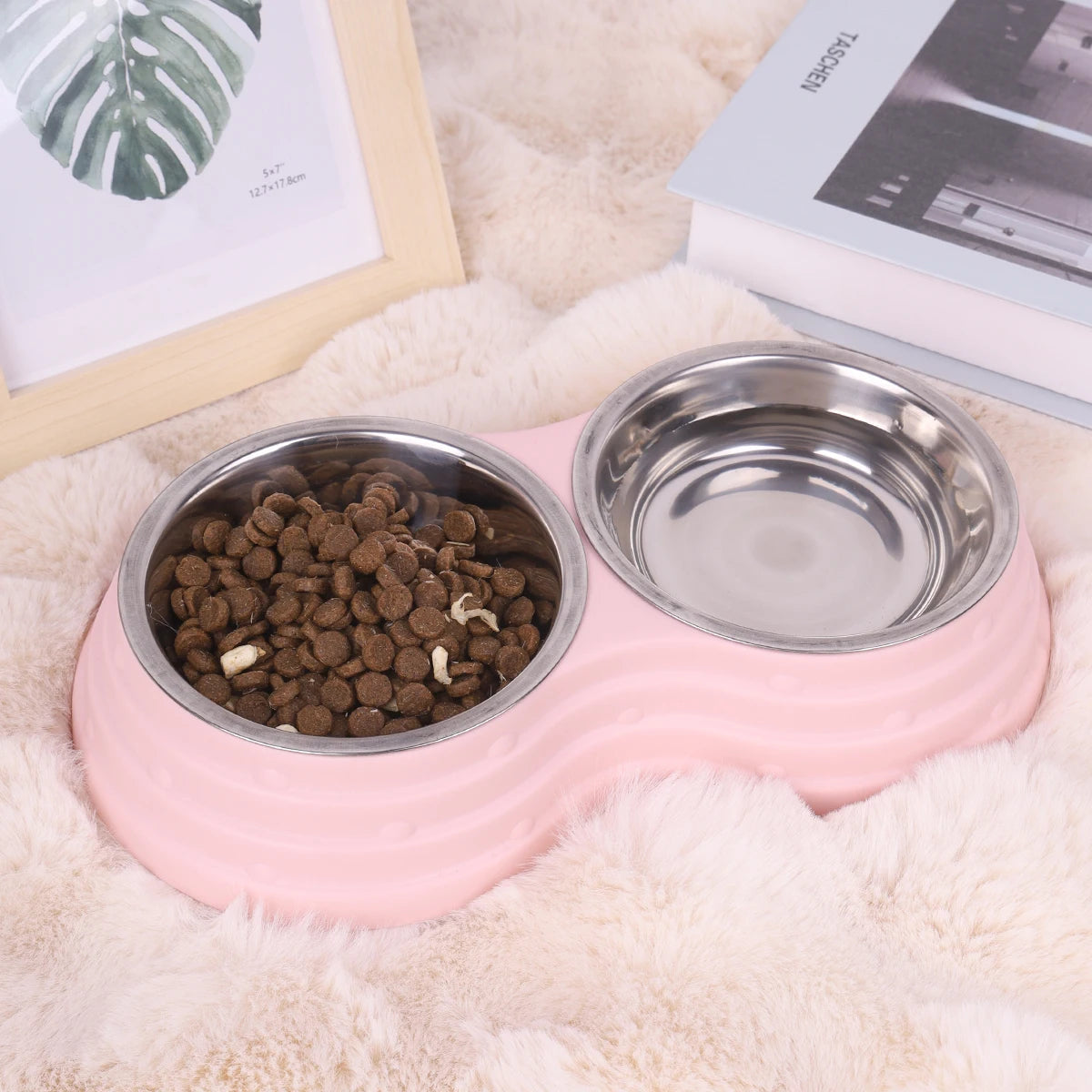 Pink double pet bowl set with stainless steel bowls filled with dry pet food and water