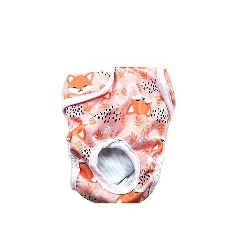 Pink reusable female dog diaper with fox and floral print, tail hole and adjustable hook-and-loop fastening
