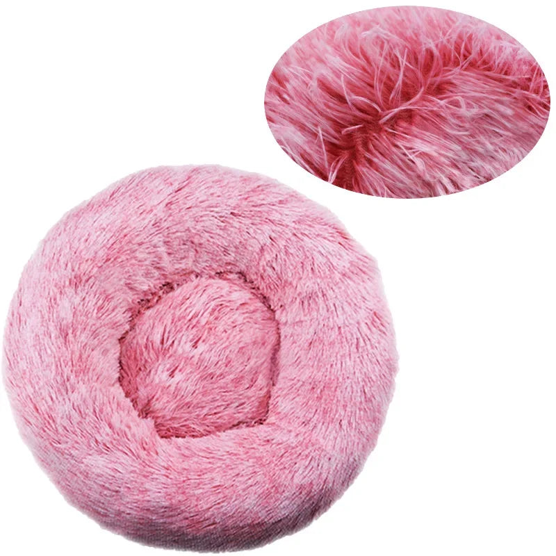 Pink round plush donut pet bed with soft faux fur and raised cushioned sides for cats and small dogs