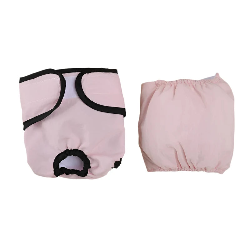 Pink reusable dog diaper with tail hole, adjustable fastening and matching absorbent liner