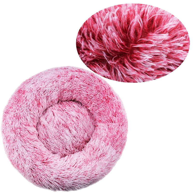 Pink round plush donut pet bed with soft faux fur and raised cushioned sides for cats and small dogs
