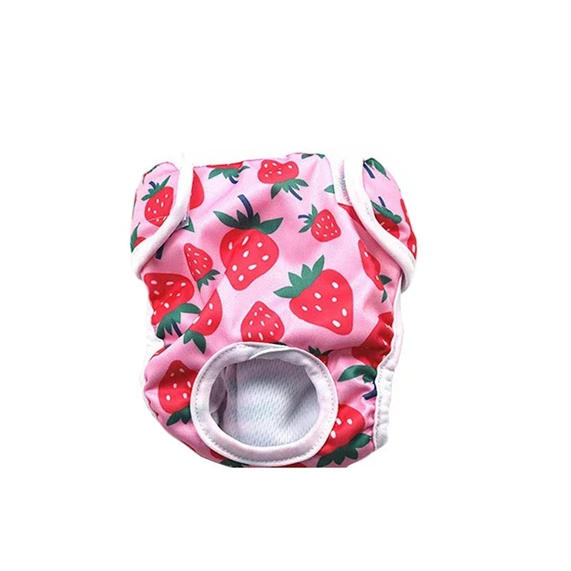 Pink reusable female dog diaper with strawberry print, tail hole and adjustable fastening