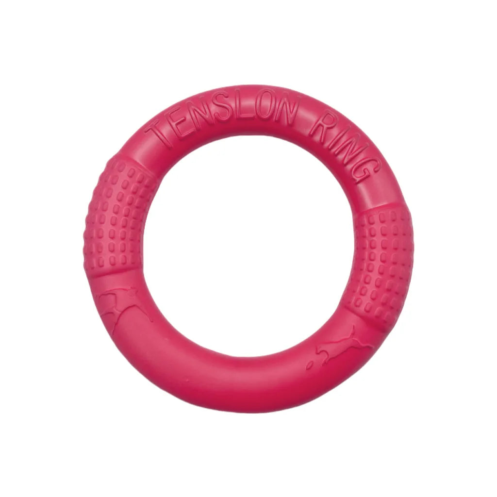 Pink ring-shaped dog chew toy with textured grip sections for chewing and interactive play