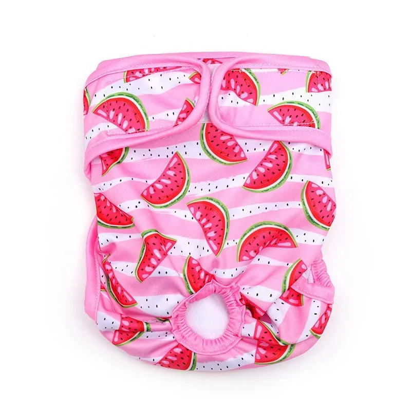 Pink reusable female dog diaper with watermelon print, tail hole and adjustable hook-and-loop fastening